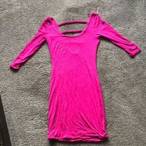 Hot pink body con dress with braided back.